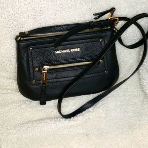 Michael Kors black with gold cross body bag